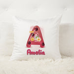 White pillow with a decorative letter 'A' and name 'Amelia' on a white background