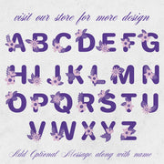 Purple floral alphabet letters on a textured white background with text inviting to visit a store for more designs.