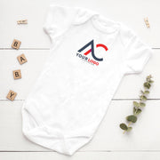 White custom-logo baby bodysuit with a red and navy sample business logo and “Your logo” lettering.