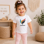 Smiling toddler wearing a white T-shirt with a colourful feather-style sample company logo.