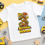 White personalised Nickson third birthday T-shirt with a large number 3, construction trucks and yellow lettering.
