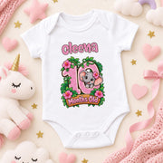 White personalised 10 months old baby bodysuit with pink numbers, a koala, green leaves and flowers.