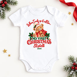 White personalised “When I wake up it will be my first Christmas” bodysuit with a festive teddy bear and year.
